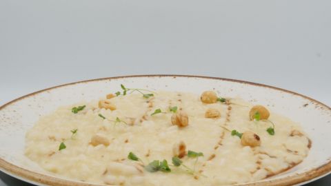 Risotto Grana Padano and hazelnuts, balsamic
